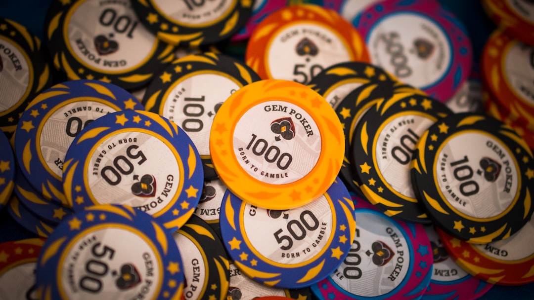 a pile of casino chips sitting on top of each other